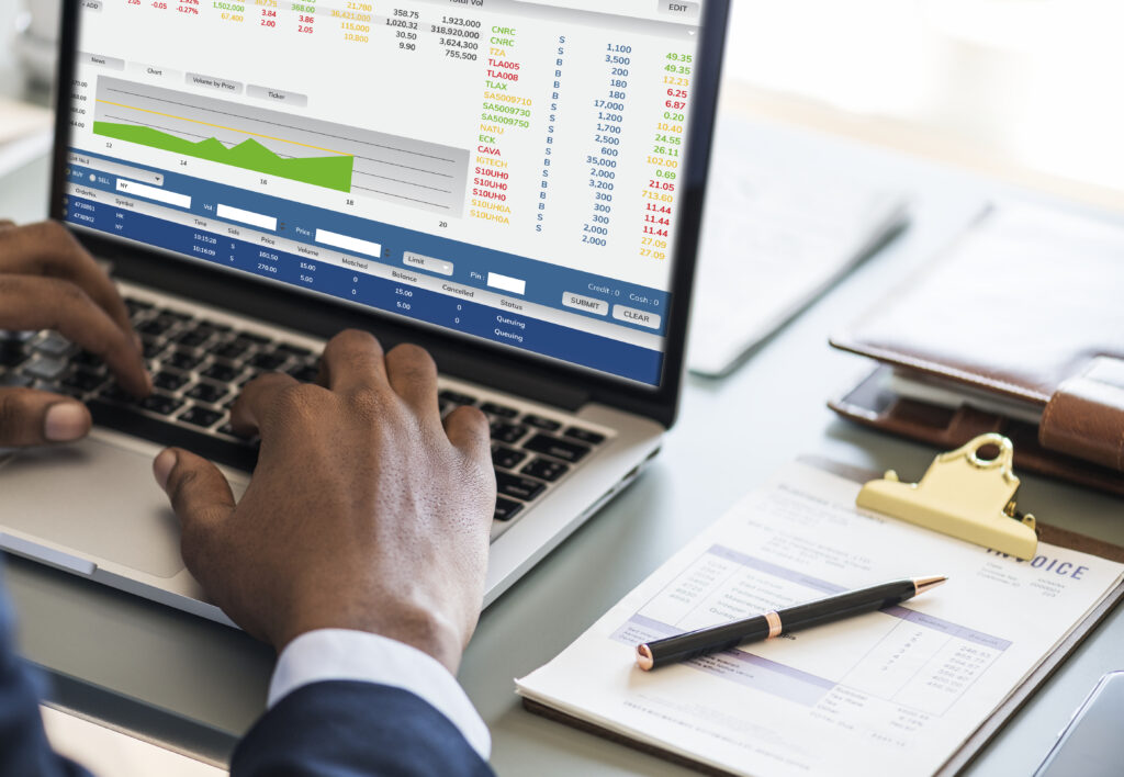 black businessman using computer laptop